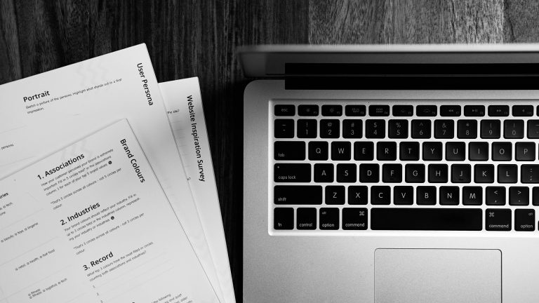 Professional CV displayed on screen with AI assistant