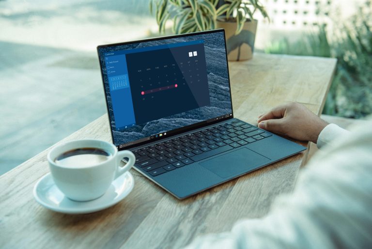 Small business owner using AI tools on a laptop