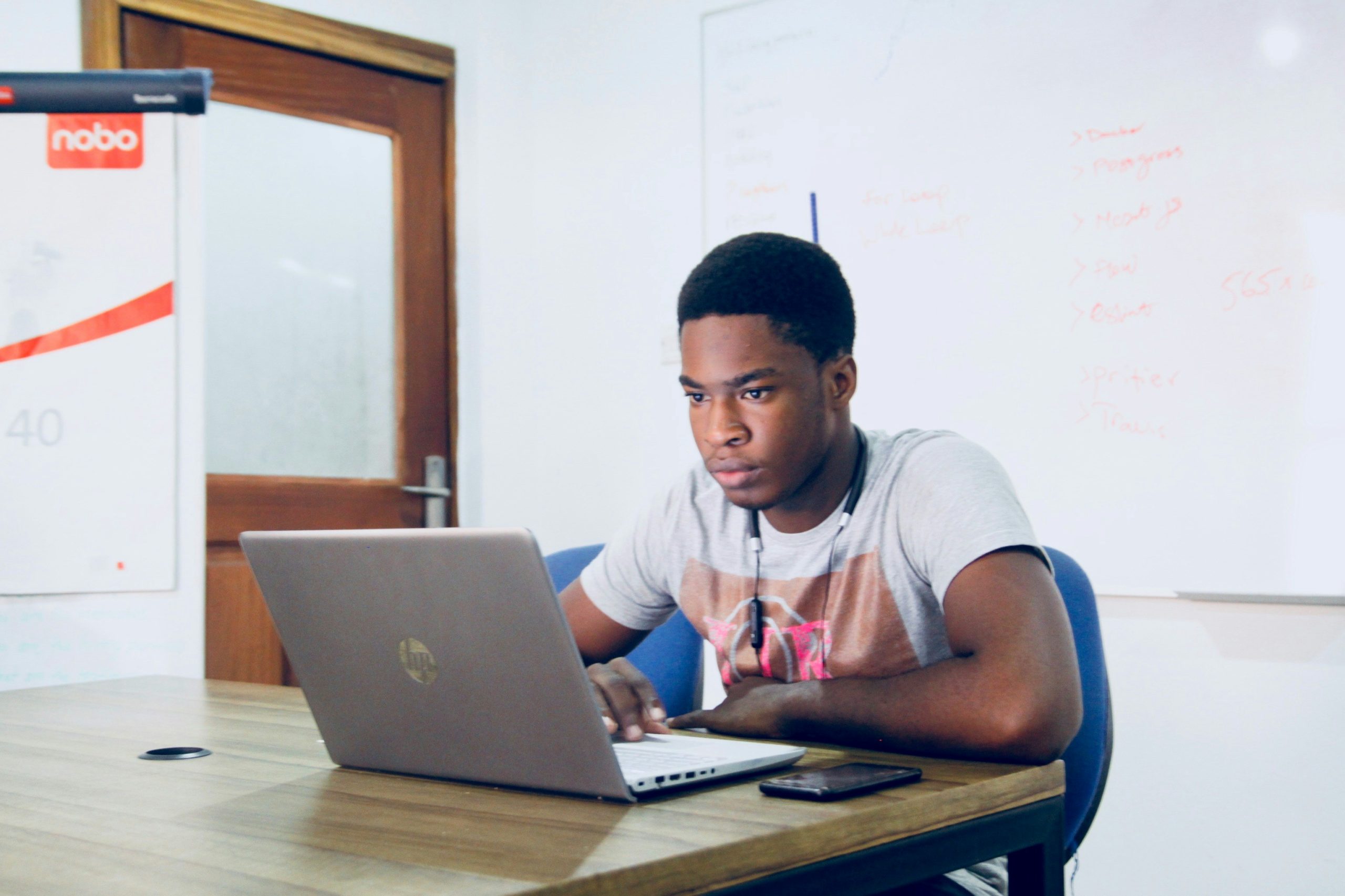 Student using AI tools to study on a laptop